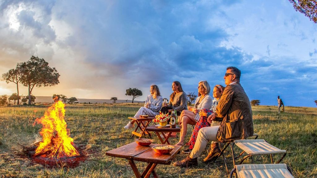 Private Sunset Sundowner — Chilled champagne and panoramic views over the African savannah.